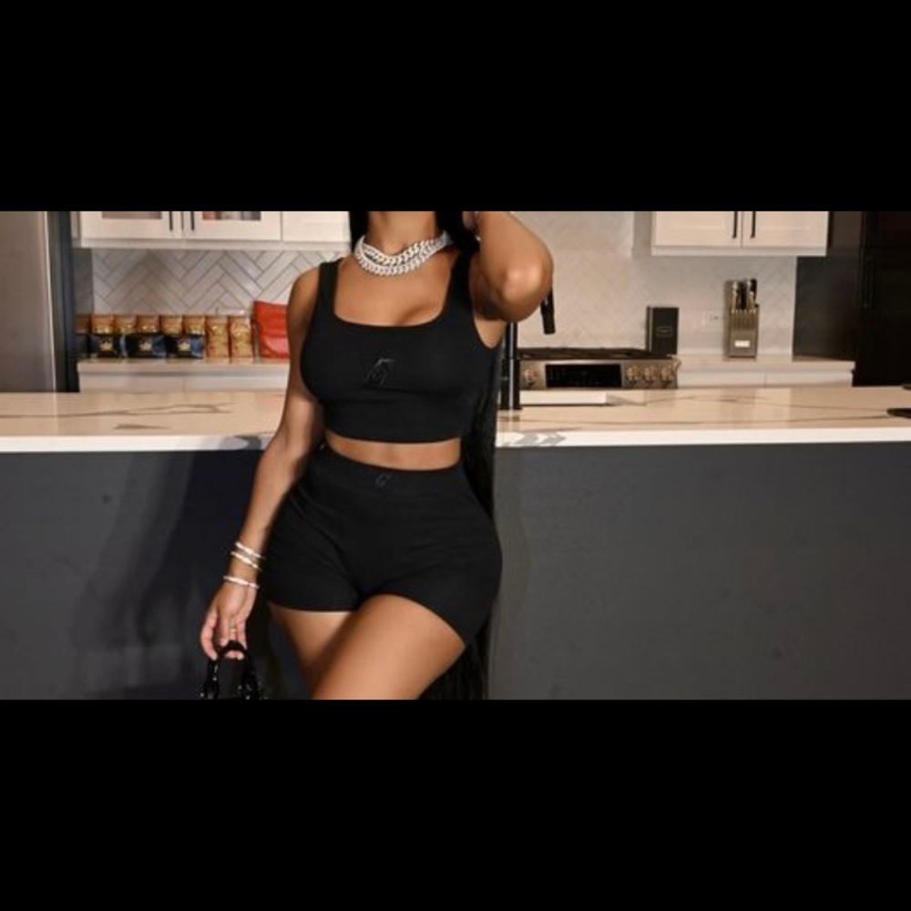 Comes as a set, ribbed crop top, boyfriend styled brief bottoms.